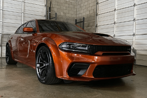 Upgrade Your Ride At Our Performance Shop In Queen Creek AZ with Ace Performance Automotive image of rust color performance vehicle that just was in the shop
